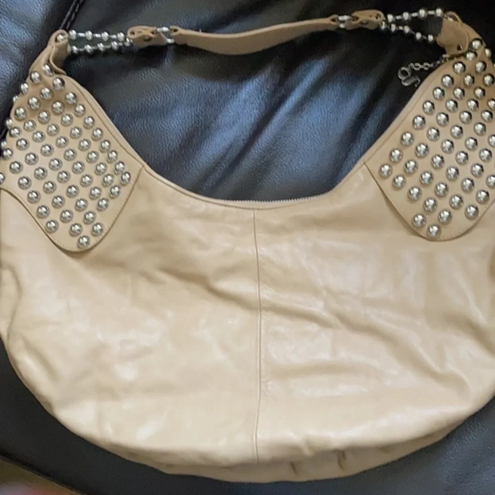 G series camel faux leather hobo purse with large silver decorative studs
